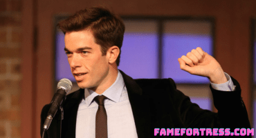 where did john mulaney grow up in chicago-min